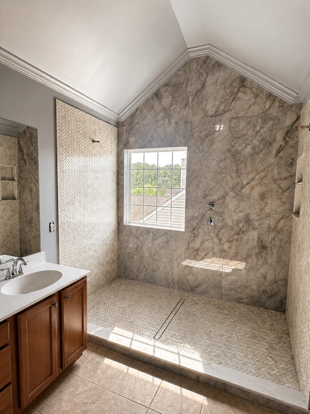 Bathroom vanity area after remodel by Paez And More